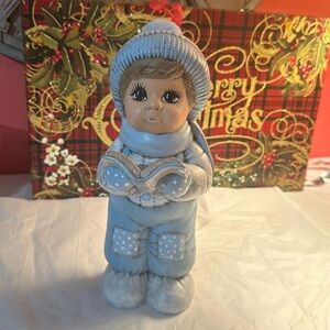 Starlite boy hand painted ceramic Christmas caroler